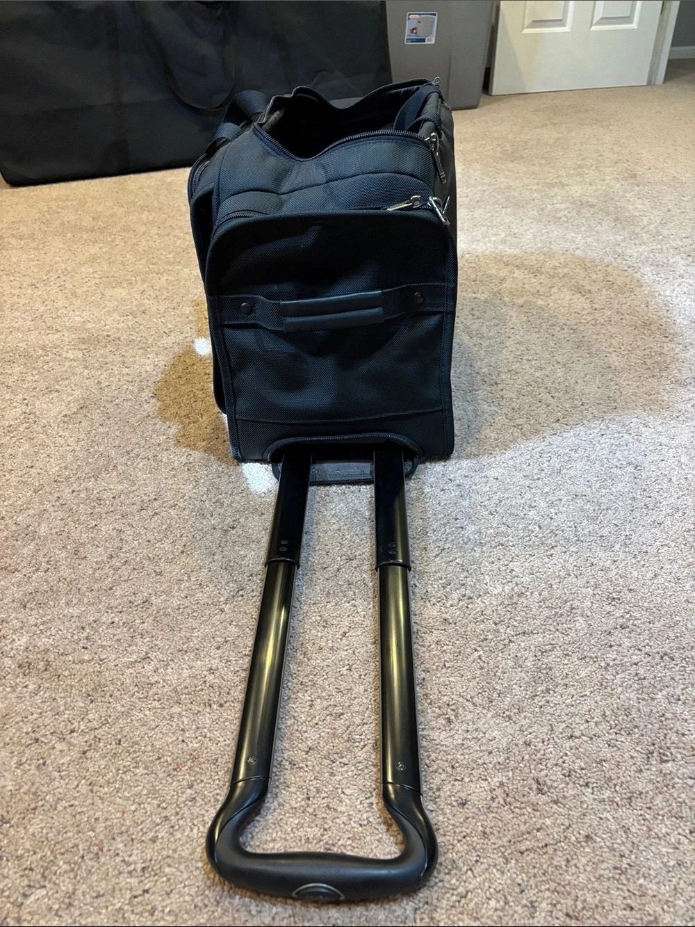 Tumi Black Rolling Carry-On Duffel with Wheels and handle